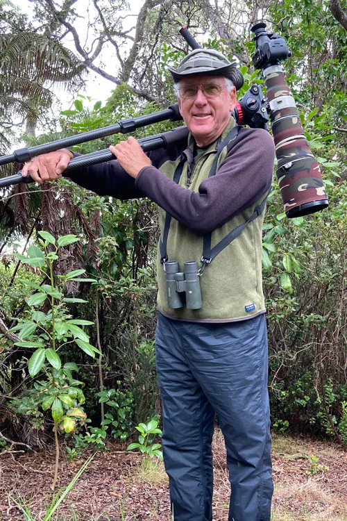 Jack Jeffrey with his camera in the forest